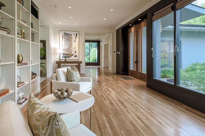 747 Bromfield Road Hillsborough, CA 94010 - Photo 7 of 76 a living room with furniture and a large window