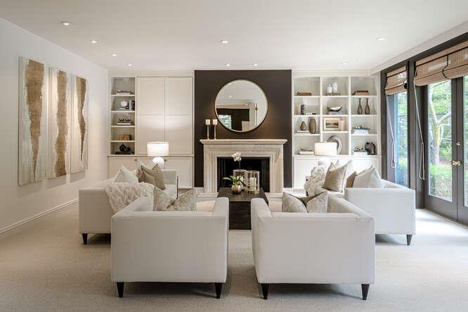747 Bromfield Road Hillsborough, CA 94010 - Photo 9 of 76 a living room with furniture and a fireplace