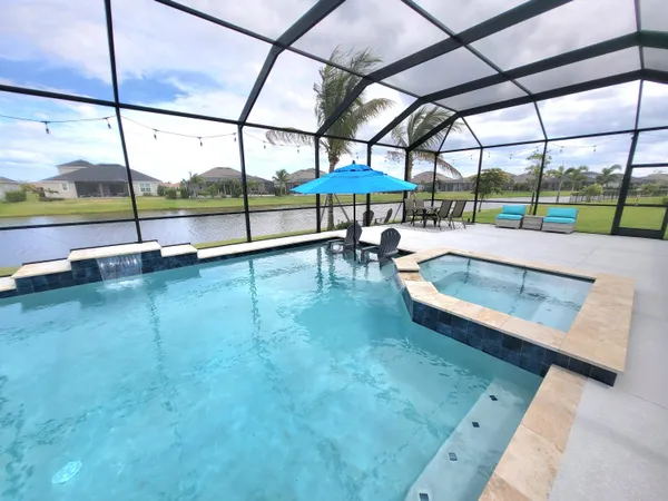 a swimming pool with outdoor view