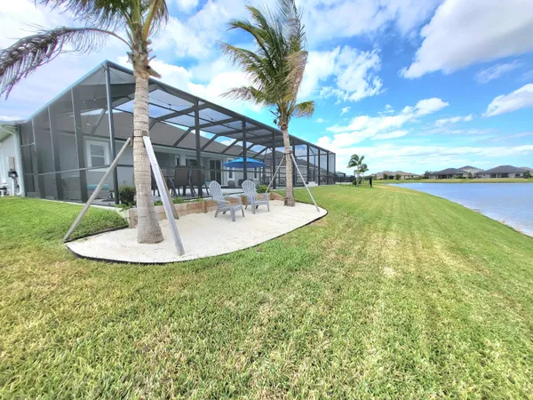 a view of a house with swimming pool