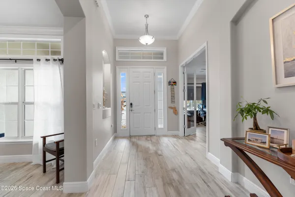 a view of a livingroom with wooden floor