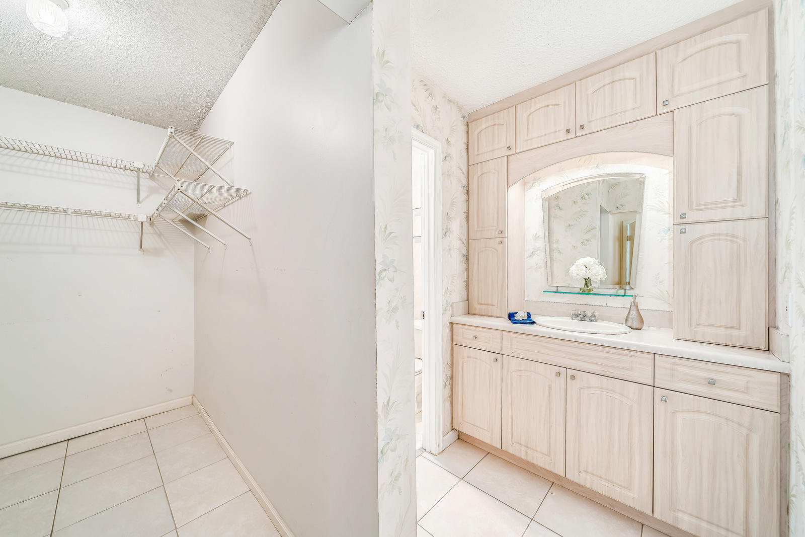 7430 Chablis Court Boca Raton, FL 33433 - Photo 31 of 47 Master bath/walk-in closet (down)