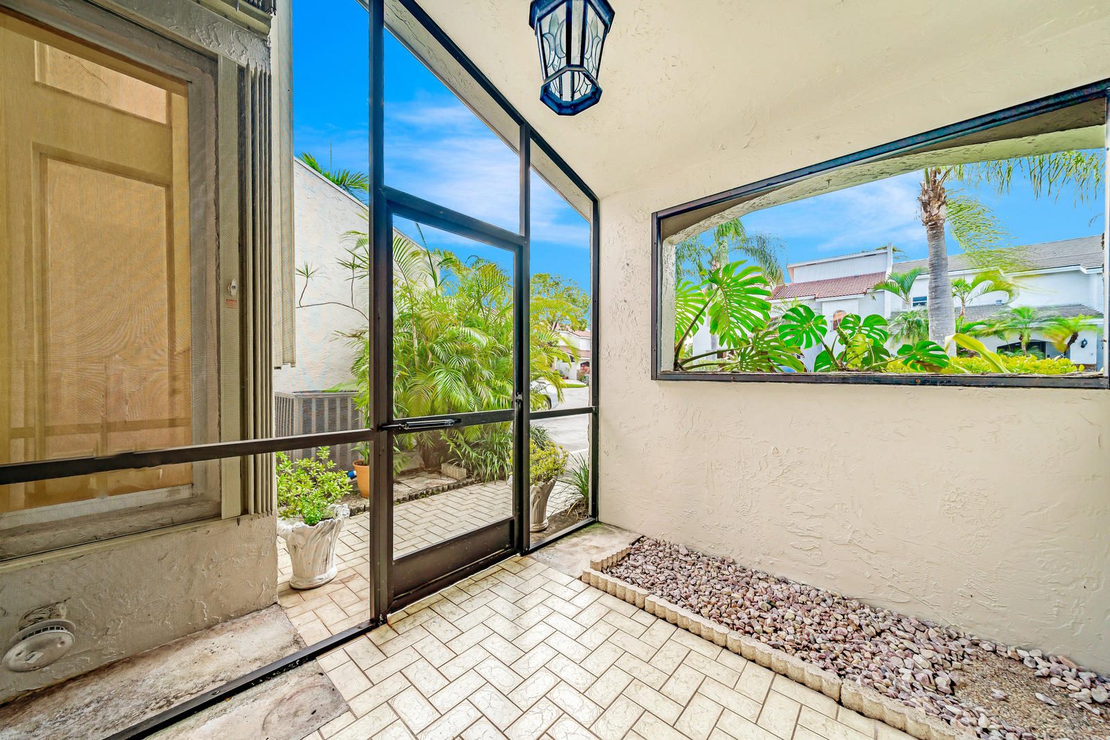 7430 Chablis Court Boca Raton, FL 33433 - Photo 7 of 47 Screened/covered entryway