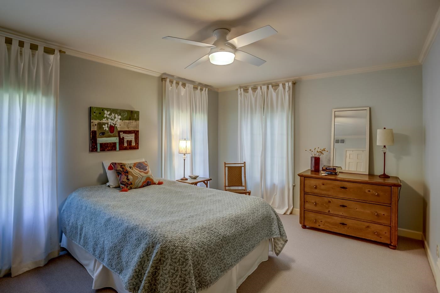 4481 Barfield Road Memphis, TN 38117 - Photo 21 of 32 a bedroom with a bed and a dresser