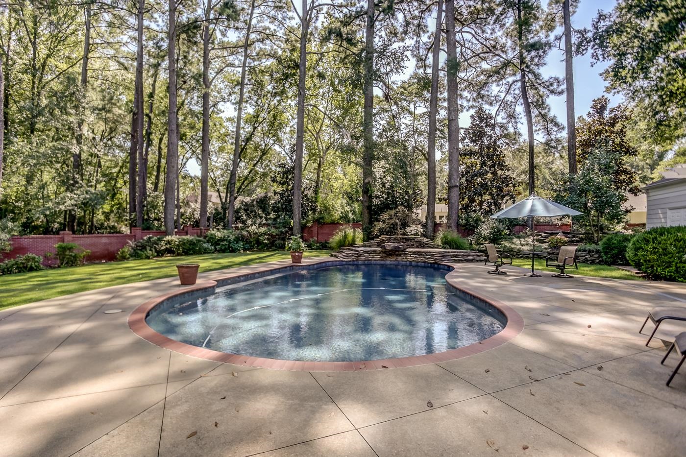 4481 Barfield Road Memphis, TN 38117 - Photo 30 of 32 a view of a swimming pool with a sitting area