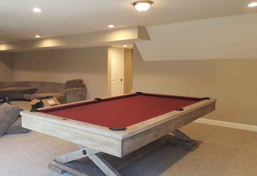 40 Green Street Foxboro, MA 02035 - Photo 13 of 16 a room with pool tables and a rug