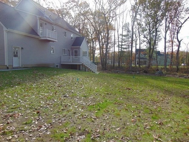 40 Green Street Foxboro, MA 02035 - Photo 15 of 16 a backyard of a house with lots of green space