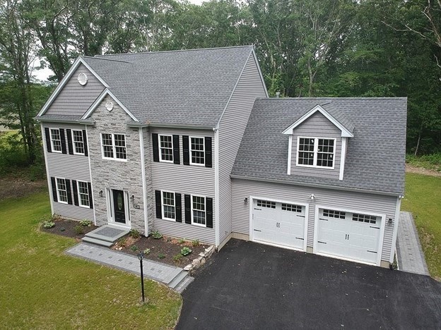 40 Green Street Foxboro, MA 02035 - Photo 2 of 16 a aerial view of a house next to a yard