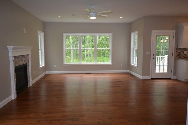 40 Green Street Foxboro, MA 02035 - Photo 7 of 16 a view of an empty room with wooden floor and a window