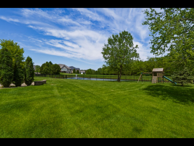 1248 Talon Lane Forsyth, IL 62535 - Photo 15 of 67 a front view of a house with a yard