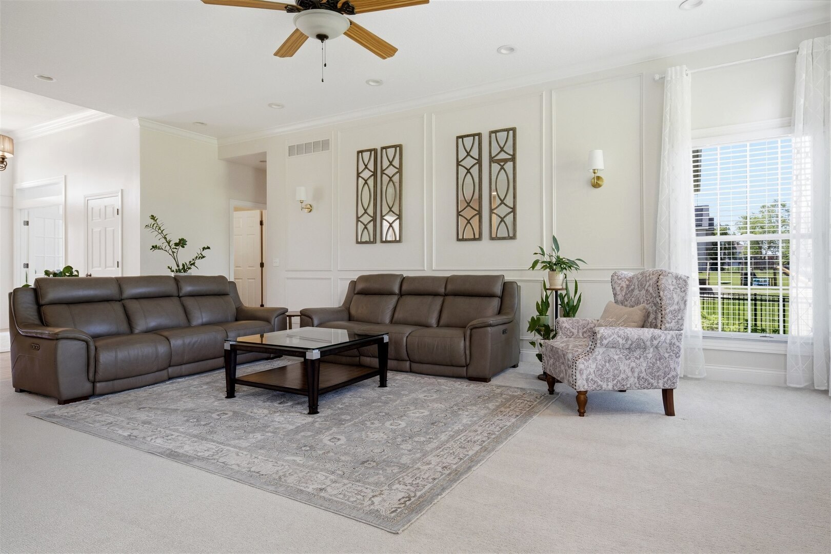 1248 Talon Lane Forsyth, IL 62535 - Photo 23 of 67 a living room with furniture ceiling fan and a window