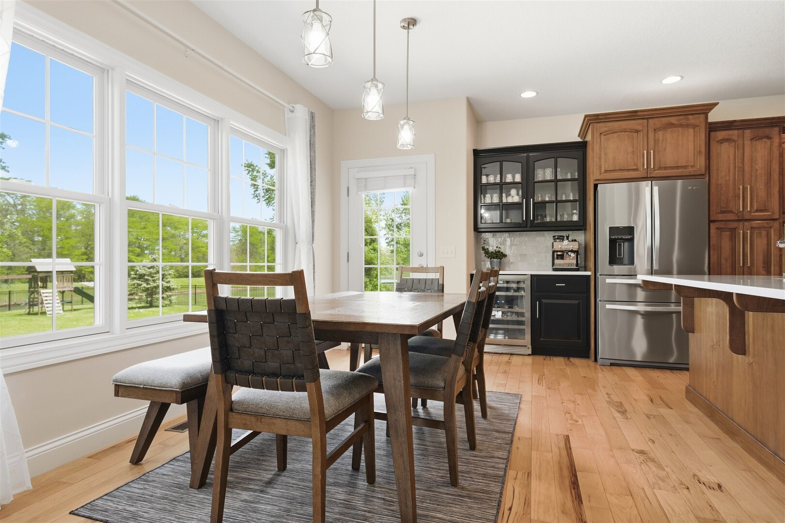 1248 Talon Lane Forsyth, IL 62535 - Photo 29 of 67 a view of a dining room with furniture window and wooden floor