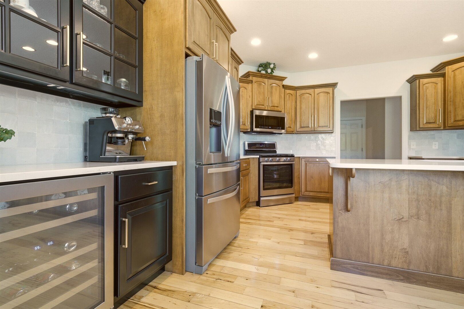 1248 Talon Lane Forsyth, IL 62535 - Photo 32 of 67 a kitchen with stainless steel appliances cabinets a sink and a stove