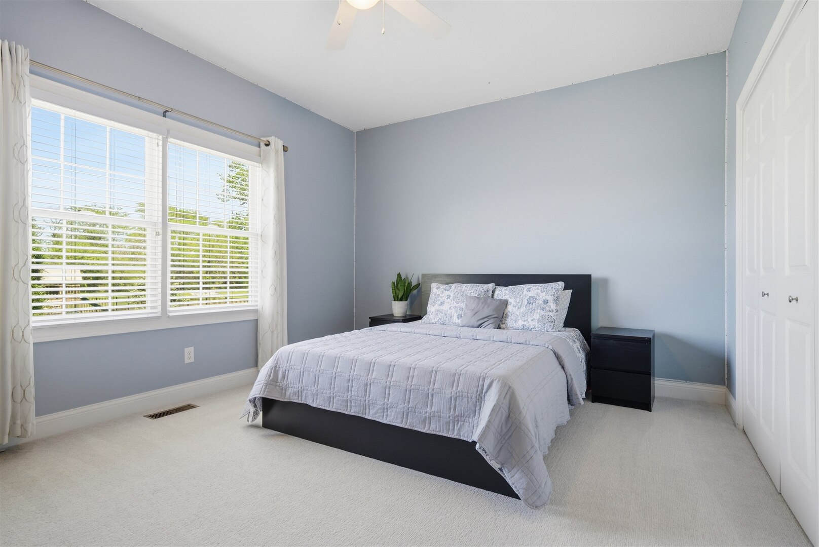 1248 Talon Lane Forsyth, IL 62535 - Photo 45 of 67 a large bed sitting in a bedroom next to a window