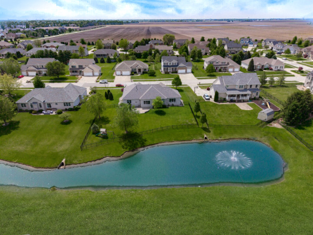 1248 Talon Lane Forsyth, IL 62535 - Photo 6 of 67 an aerial view of a house with a swimming pool