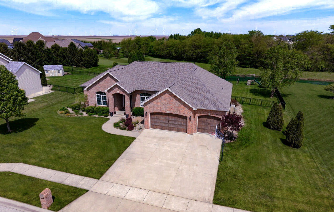 1248 Talon Lane Forsyth, IL 62535 - Photo 8 of 67 a aerial view of a house with swimming pool and a big yard