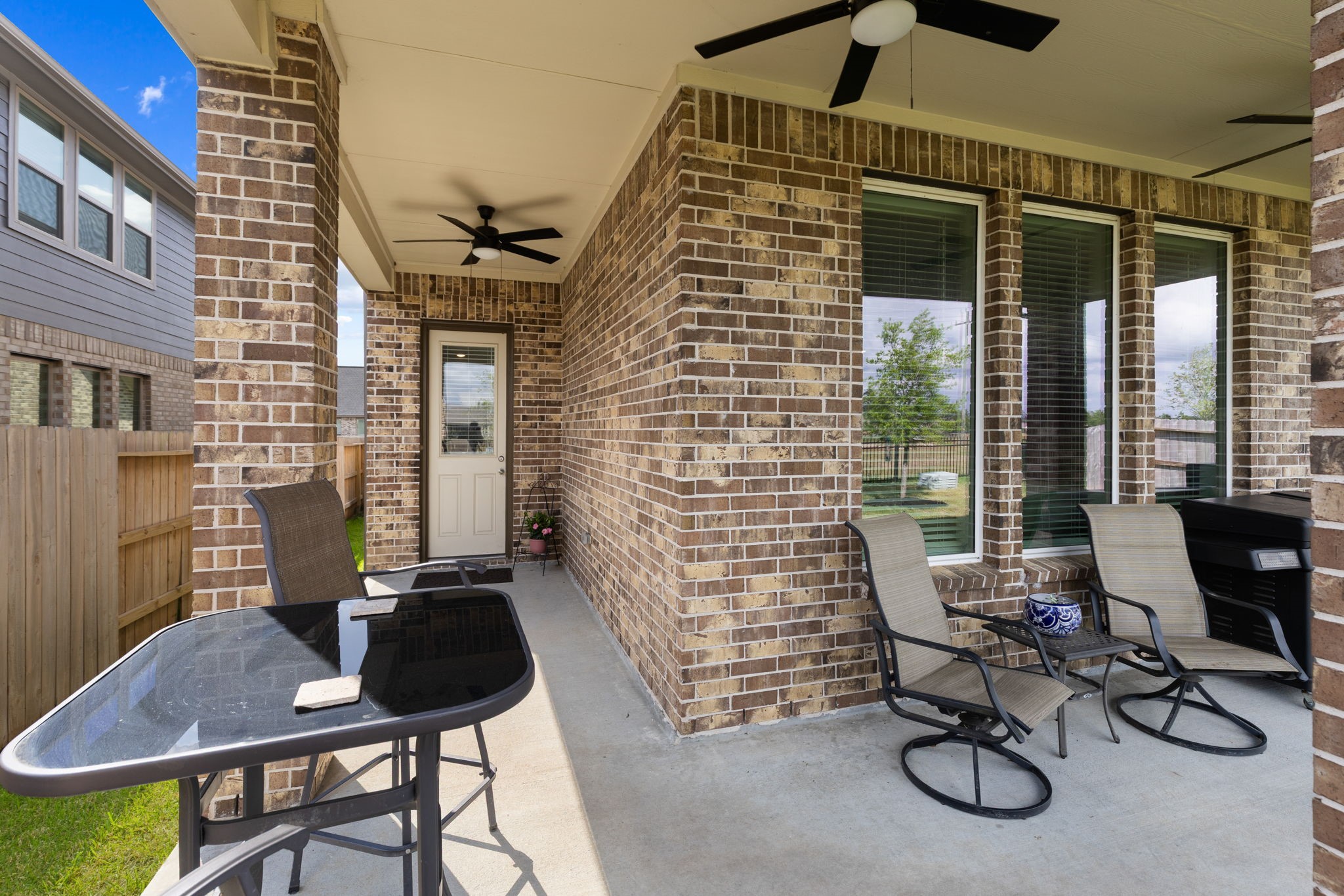 3541 Cherrybark Gable Ln Spring Spring, TX 77386 - Photo 29 of 39 Large L-shaped covered back patio with 3 ceiling fans for maximum comfort.
