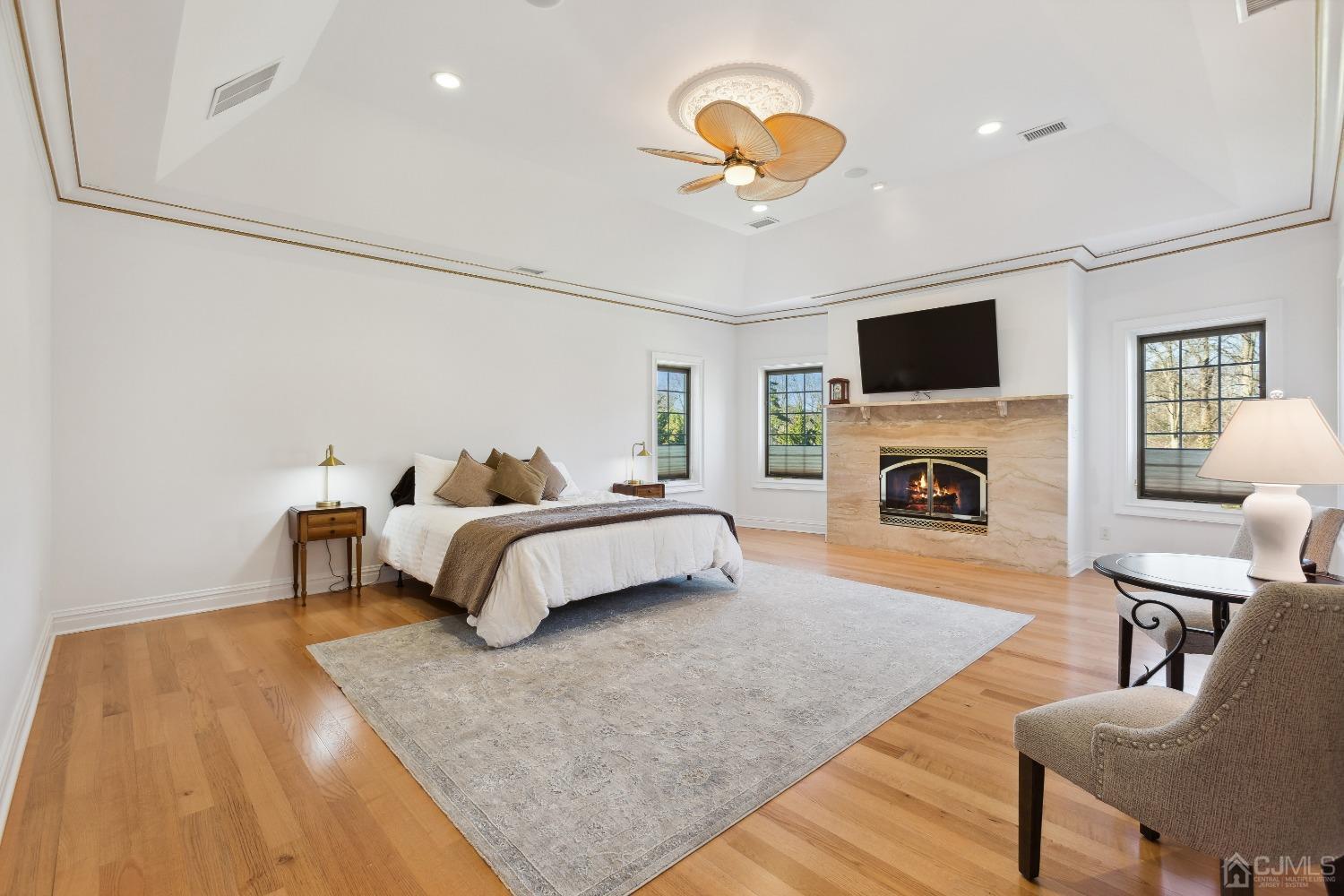 6 Longview Road Edison, NJ 08820 - Photo 33 of 74 a spacious bedroom with a bed and a fireplace
