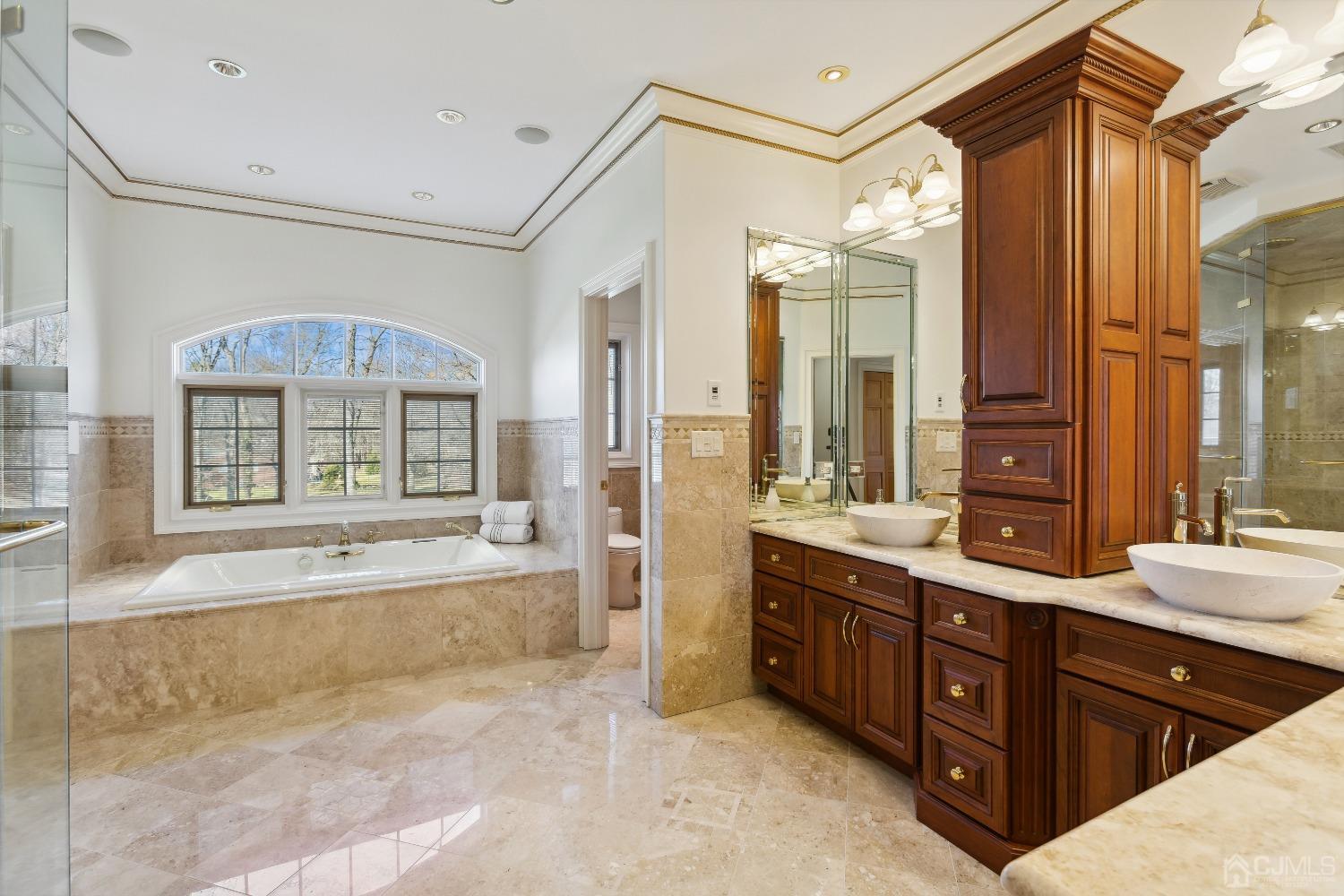 6 Longview Road Edison, NJ 08820 - Photo 36 of 74 a spacious bathroom with a tub sink shower and mirror