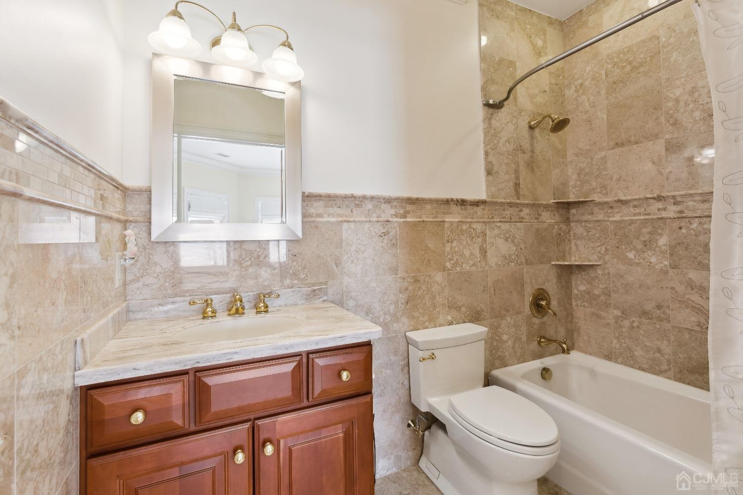 6 Longview Road Edison, NJ 08820 - Photo 45 of 74 a bathroom with a sink a toilet and shower