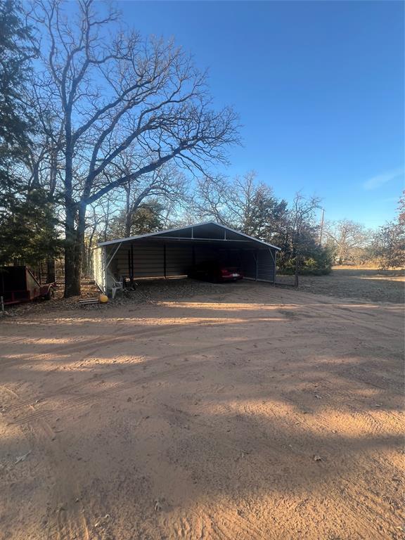 6901 Hawk Road Flower Mound, TX 75022 - Photo 16 of 24 a view of a couches in the middle of a yard