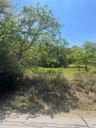 a view of a lake with a sitting area