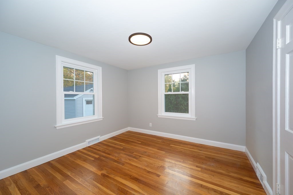2 A Circular Avenue Natick, MA 01760 - Photo 15 of 29 an empty room with a window