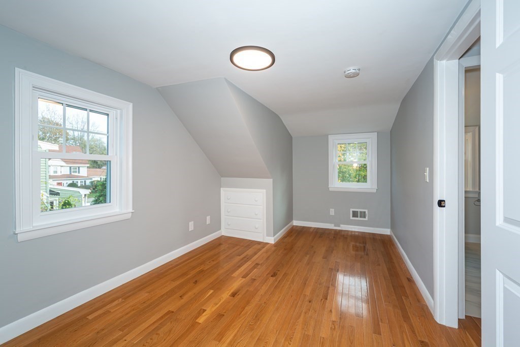 2 A Circular Avenue Natick, MA 01760 - Photo 19 of 29 a view of a room with wooden floor and windows