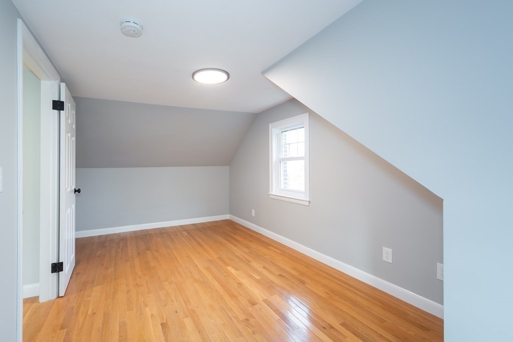 2 A Circular Avenue Natick, MA 01760 - Photo 20 of 29 wooden floor in an empty room with a window