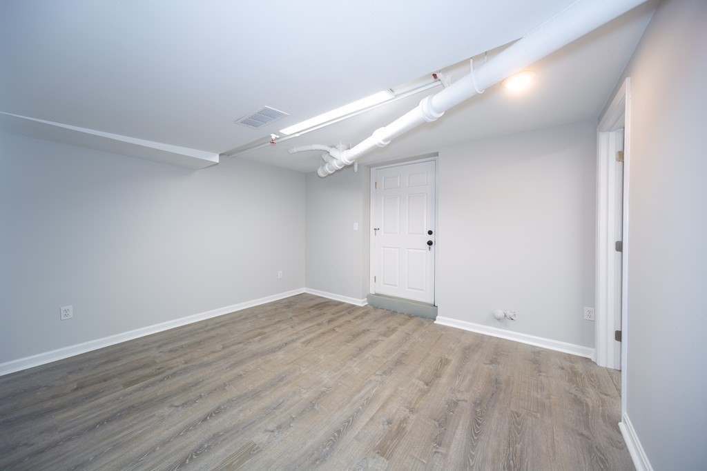 2 A Circular Avenue Natick, MA 01760 - Photo 24 of 29 wooden floor in an empty room
