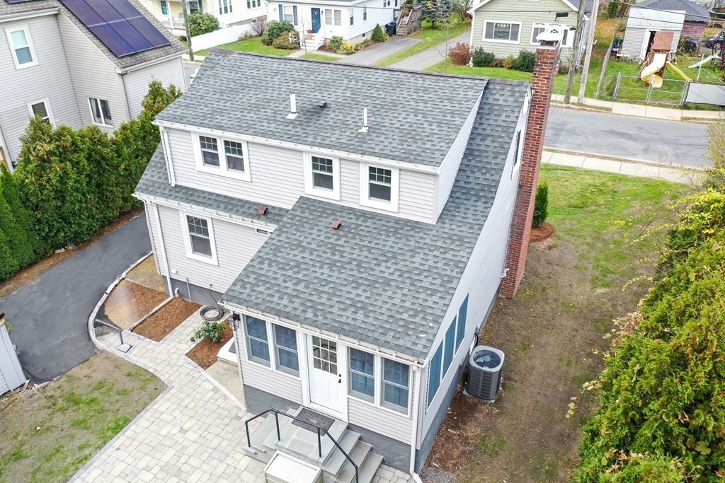2 A Circular Avenue Natick, MA 01760 - Photo 27 of 29 a front view of a house with a yard