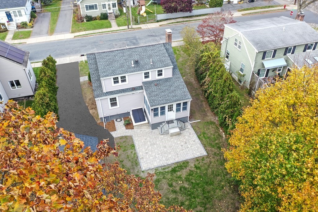 2 A Circular Avenue Natick, MA 01760 - Photo 29 of 29 an aerial view of a house with a yard