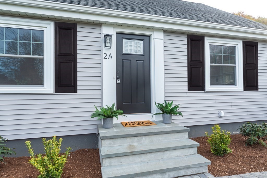 2 A Circular Avenue Natick, MA 01760 - Photo 3 of 29 a view of a house with potted plants