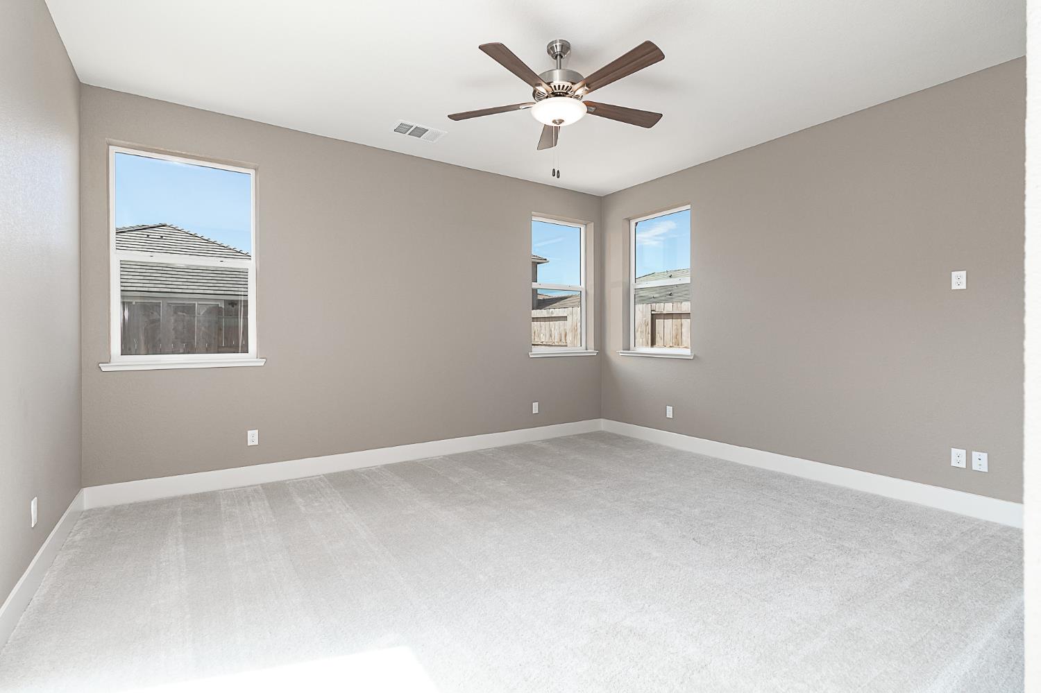1310 Veteran Street Manteca, CA 95337 - Photo 20 of 33 a view of an empty room with a window