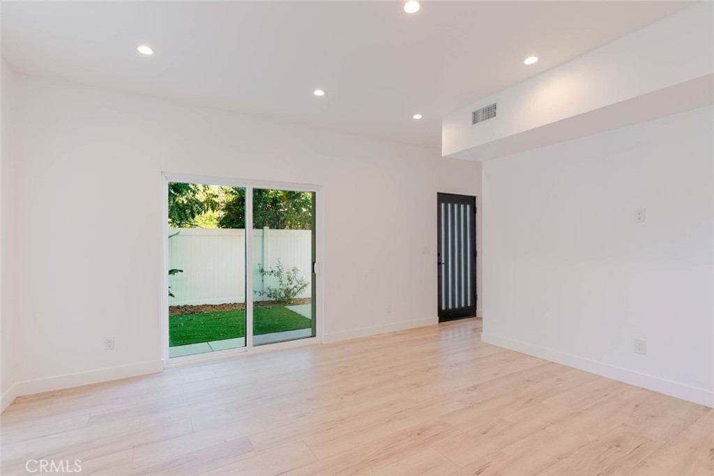 6835 Yolanda Avenue Reseda, CA 91335 - Photo 6 of 34 a view of an empty room with wooden floor