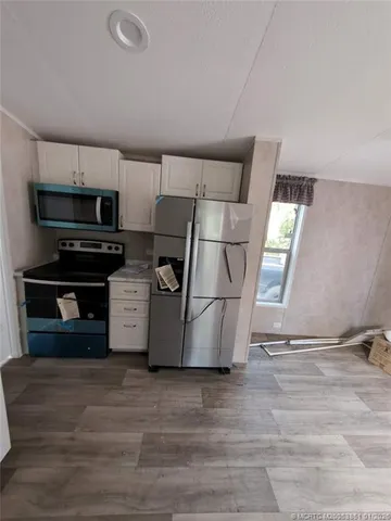 a utility room with washer and dryer