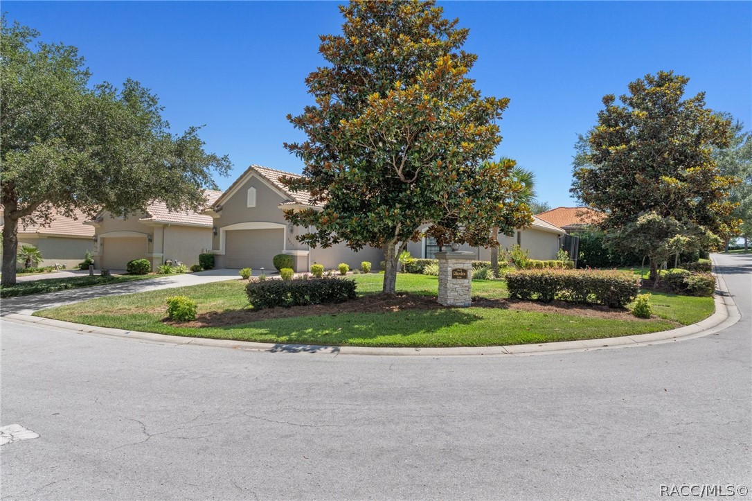 2015 North Rhodes Point Hernando, FL 34442 - Photo 3 of 82 A nice corner location in this Carefree neighborhood, offers mature landscape and includes lawn maintenance. Rhodes Pt (street on left) is a culdesac.