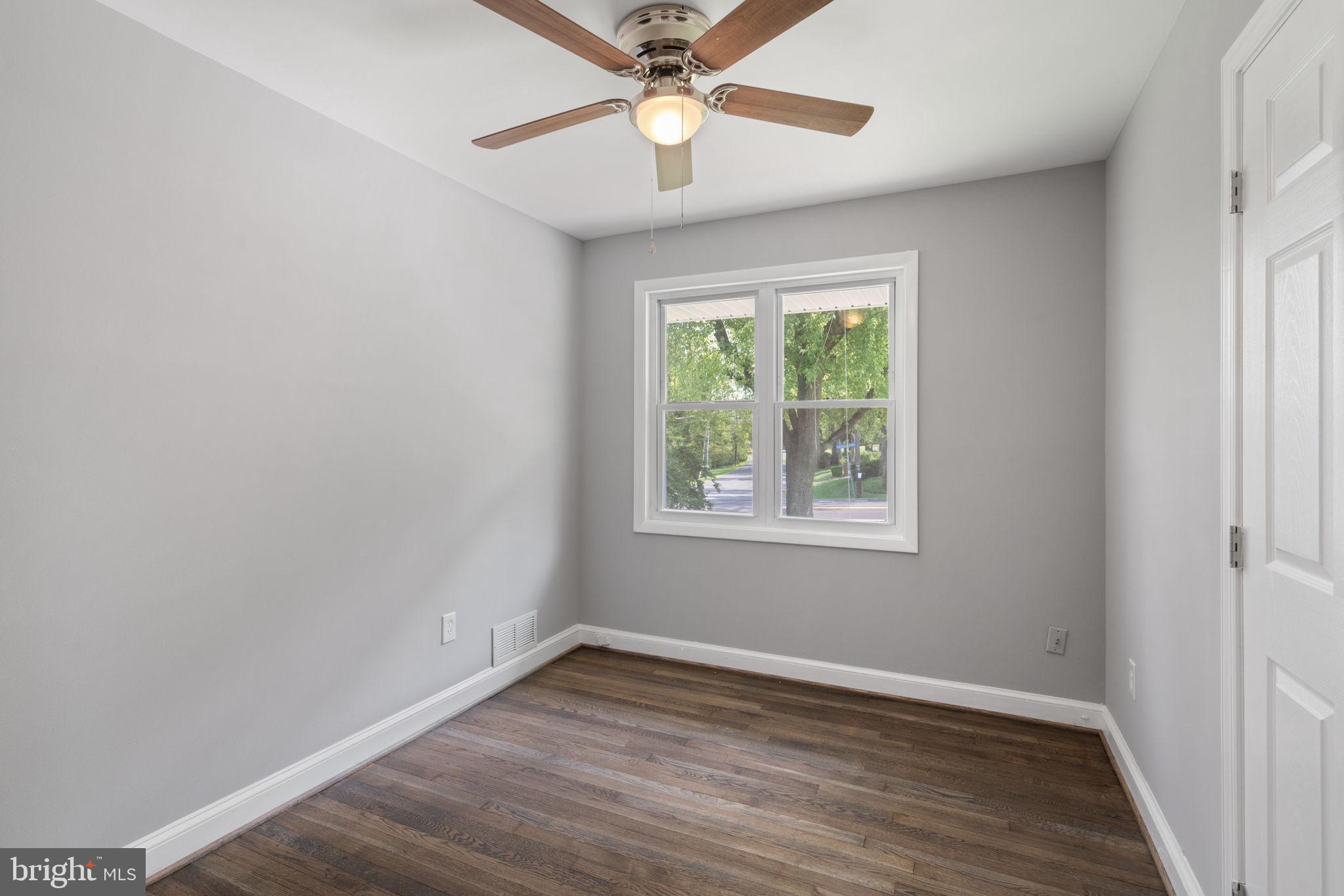 4916 Ravensworth Road Annandale, VA 22003 - Photo 16 of 42 Bedroom 1 with ceiling fan and closet