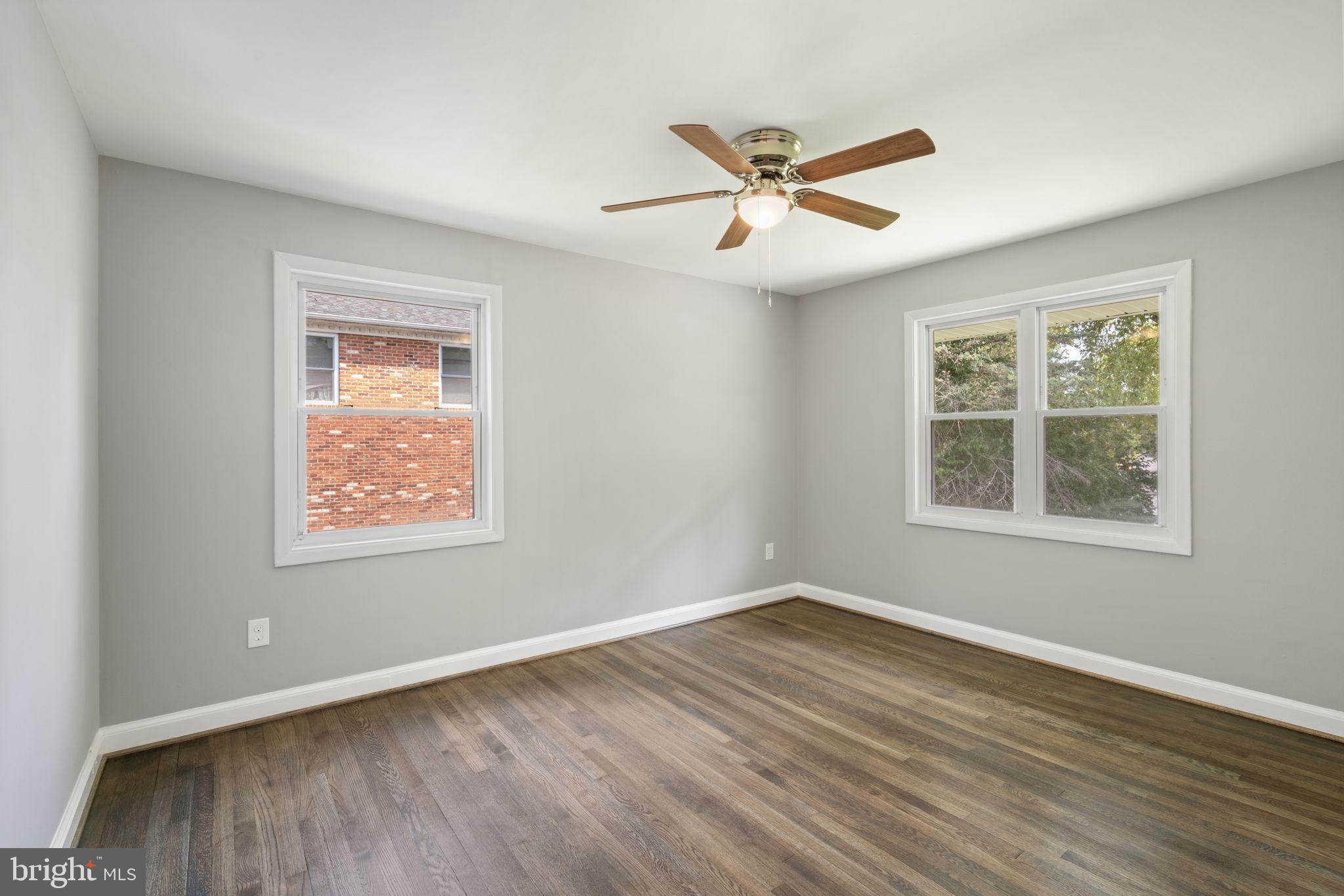 4916 Ravensworth Road Annandale, VA 22003 - Photo 18 of 42 Bedroom 2 with ceiling fan and closet