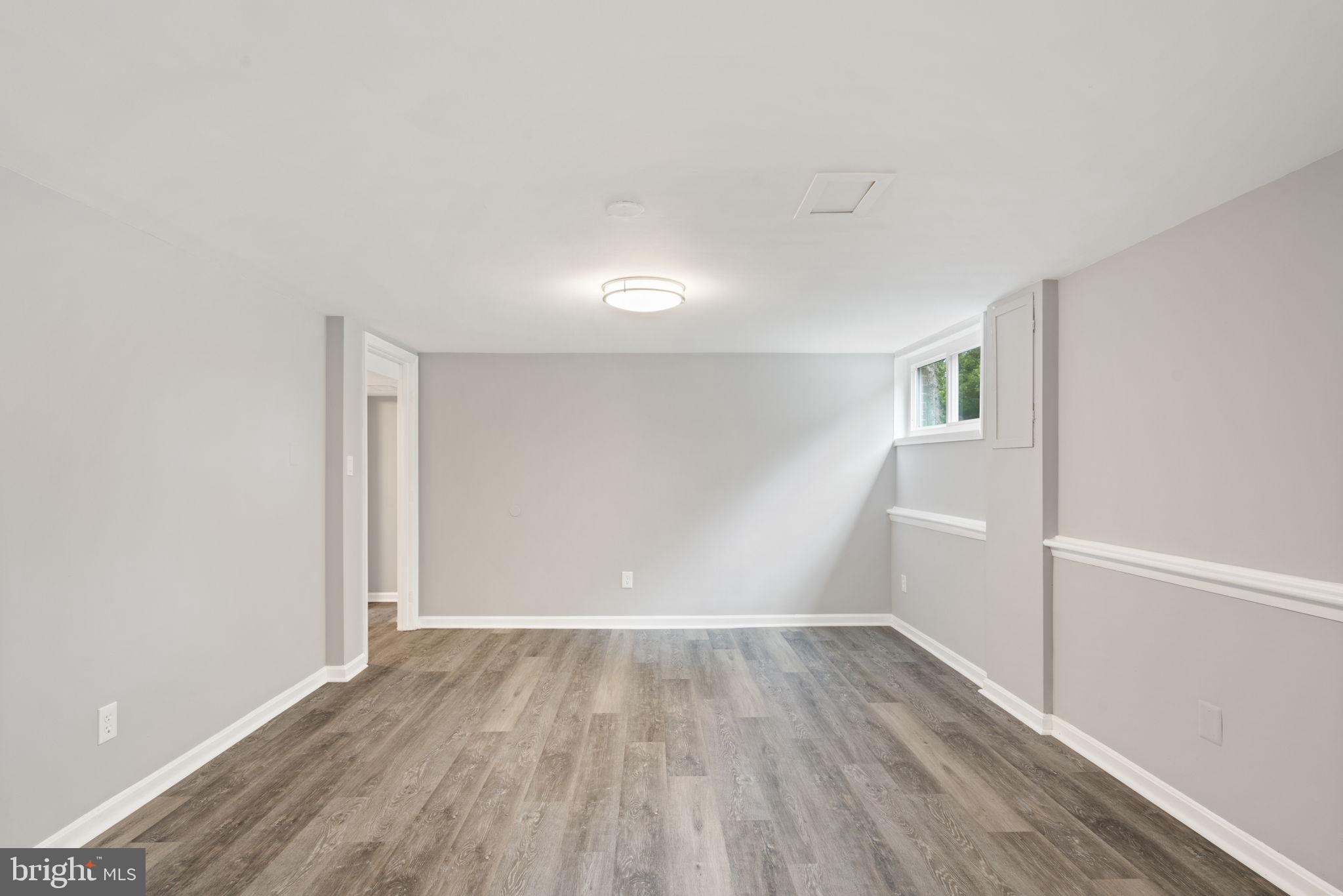 4916 Ravensworth Road Annandale, VA 22003 - Photo 27 of 42 Brand new LVP flooring in basement