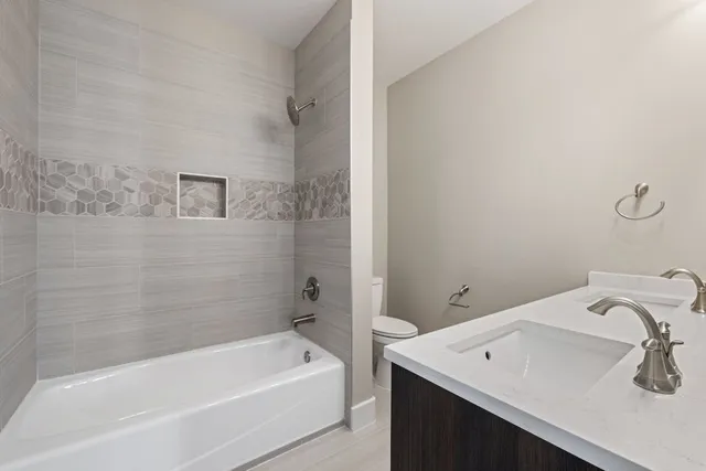 a bathroom with a sink and a bathtub