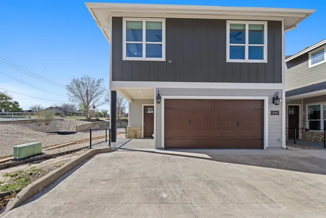 a view of a house with a large window