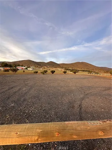 a view of an ocean beach and mountain