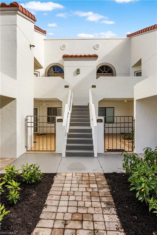 637 Beachwalk Circle, Unit E203 Naples, FL 34108 - Photo 23 of 30 a view of a entryway of the house