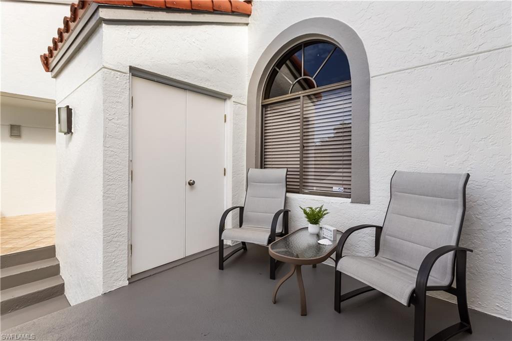 637 Beachwalk Circle, Unit E203 Naples, FL 34108 - Photo 25 of 30 a view of a livingroom with furniture and windows