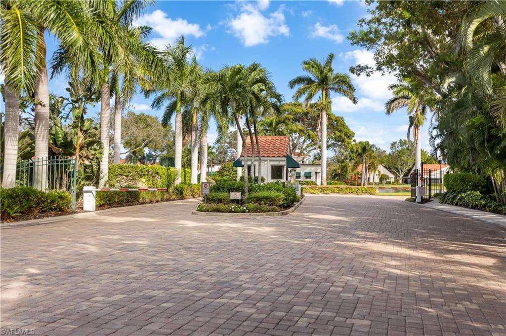 637 Beachwalk Circle, Unit E203 Naples, FL 34108 - Photo 28 of 30 a view of road and trees