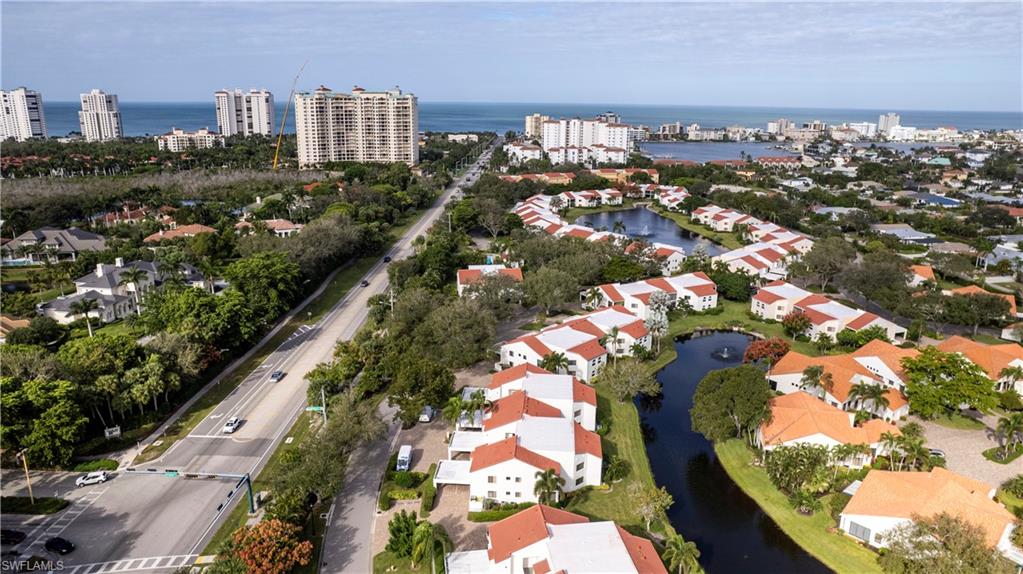 637 Beachwalk Circle, Unit E203 Naples, FL 34108 - Photo 29 of 30 an aerial view of city