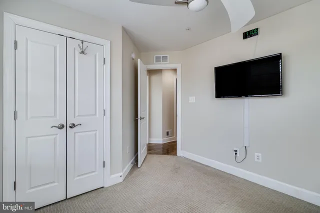 a view of a livingroom with a flat screen tv