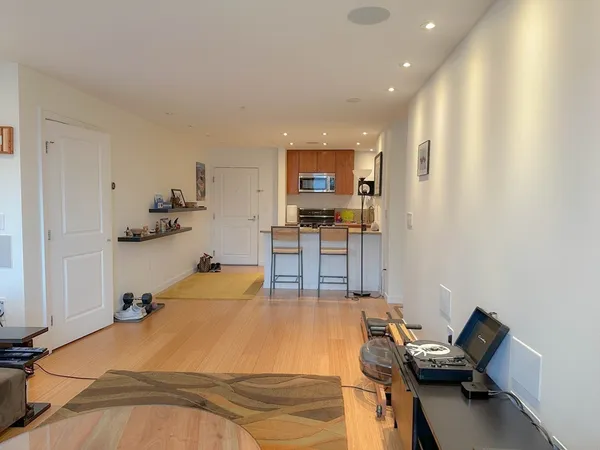 a room with a bed and furniture