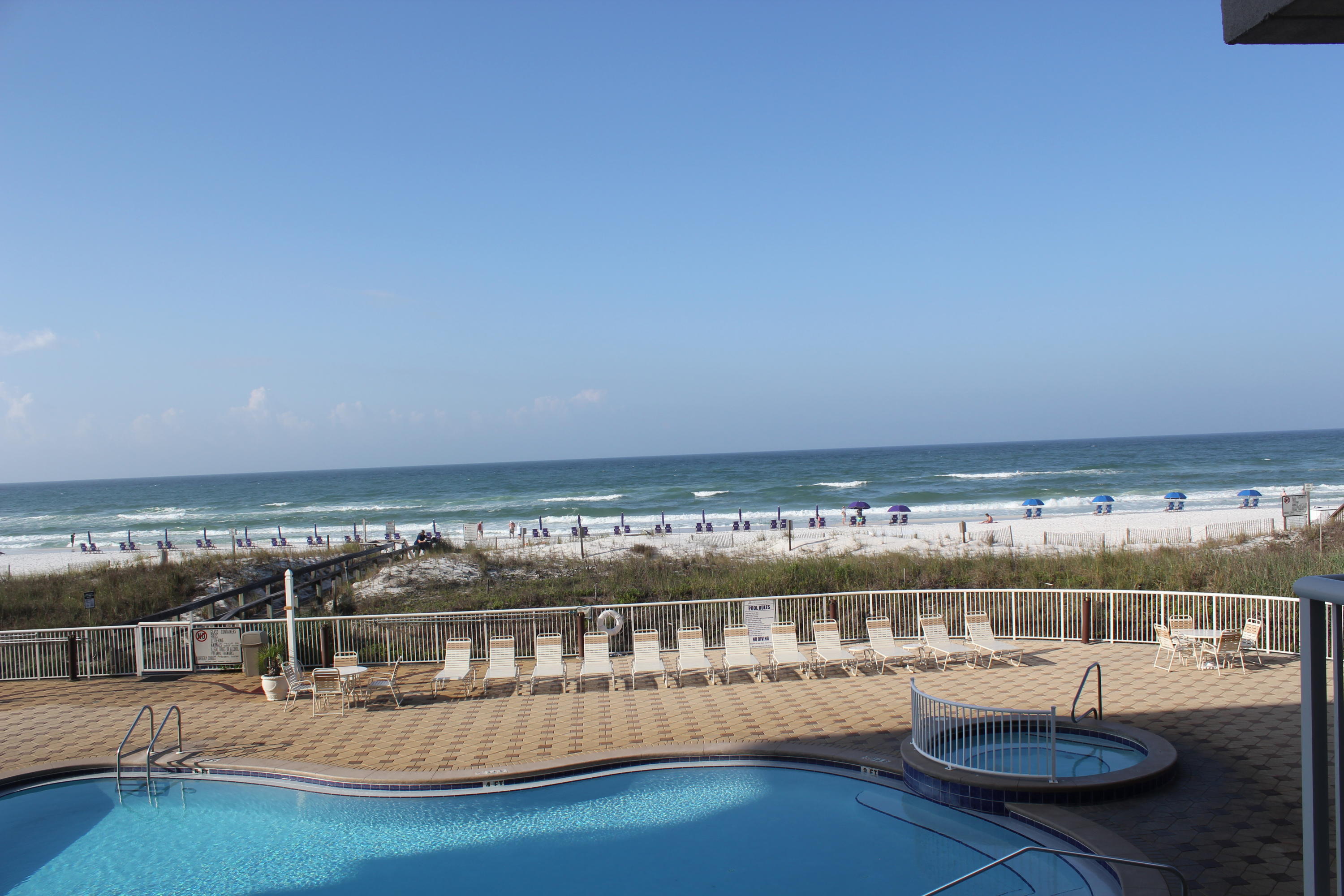 1111 Santa Rosa Boulevard, Unit 206 Fort Walton Beach, FL 32548 - Photo 37 of 46 a view of a swimming pool with an outdoor seating